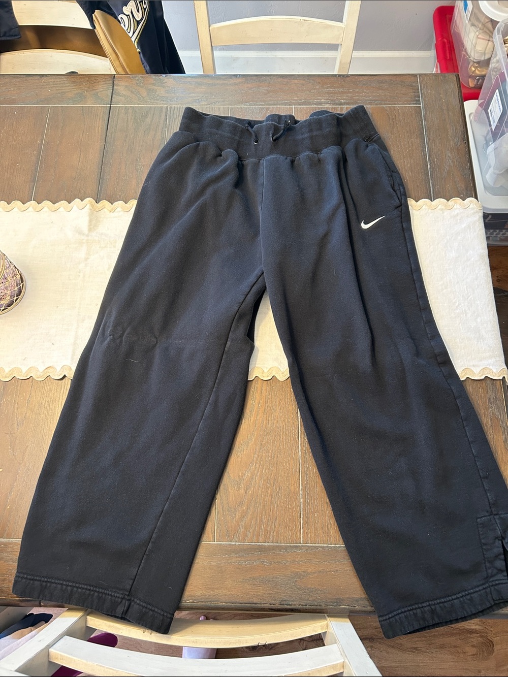 Nike Black Jogger-Style Track Pants with White Swoosh
